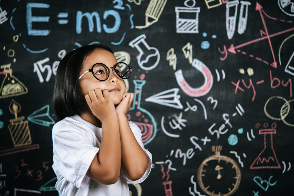 portrait happy little schoolchild wearing eyeglasses Easy I Learn